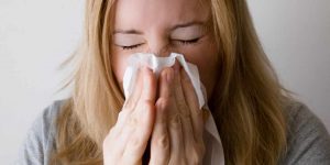 Women sneezing